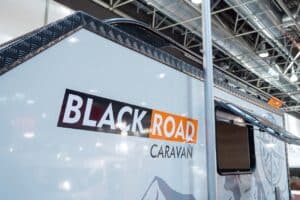 blyss speedcaravan black road logo
